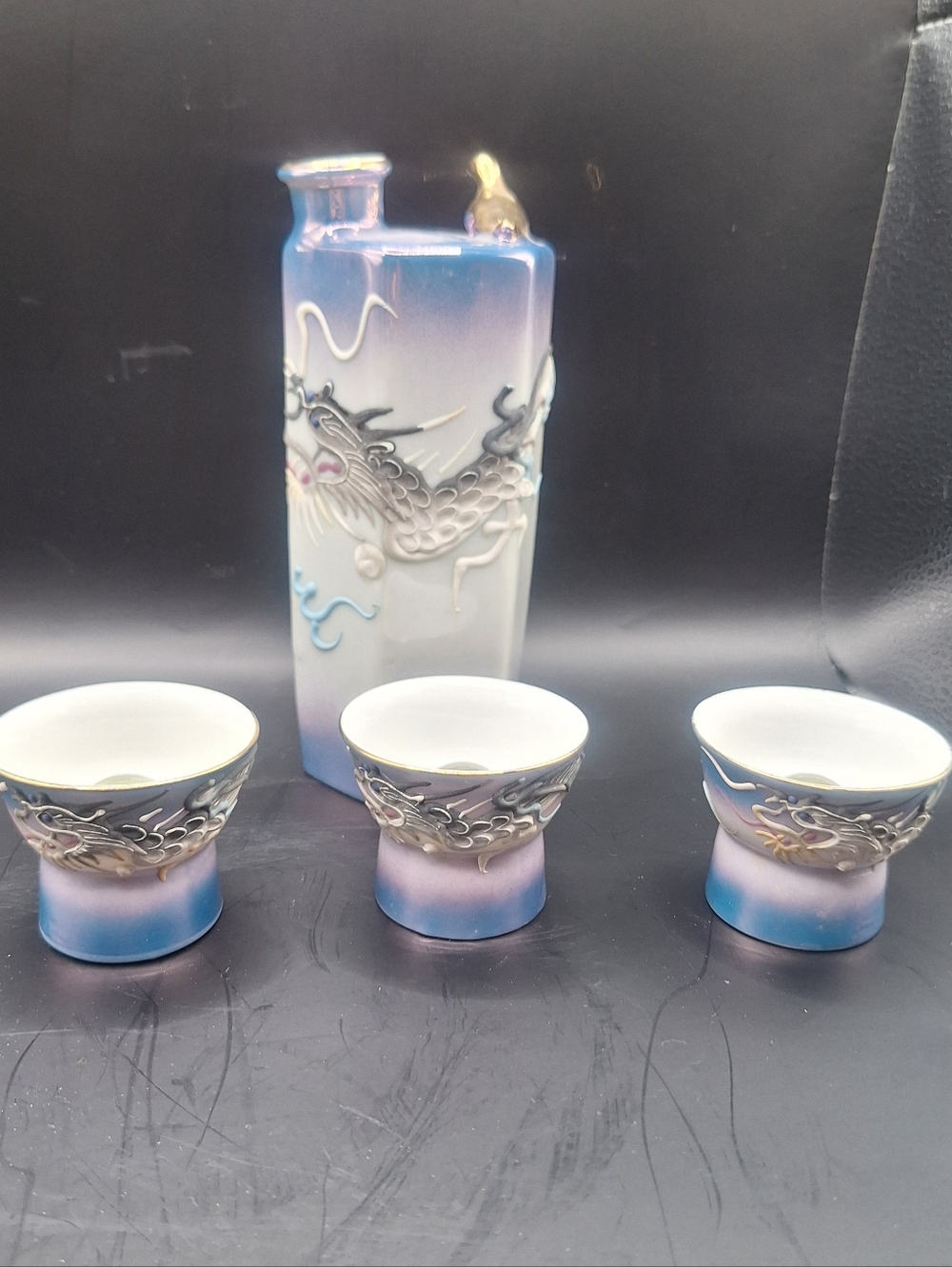 This vintage sake decanter from Japan features a unique design